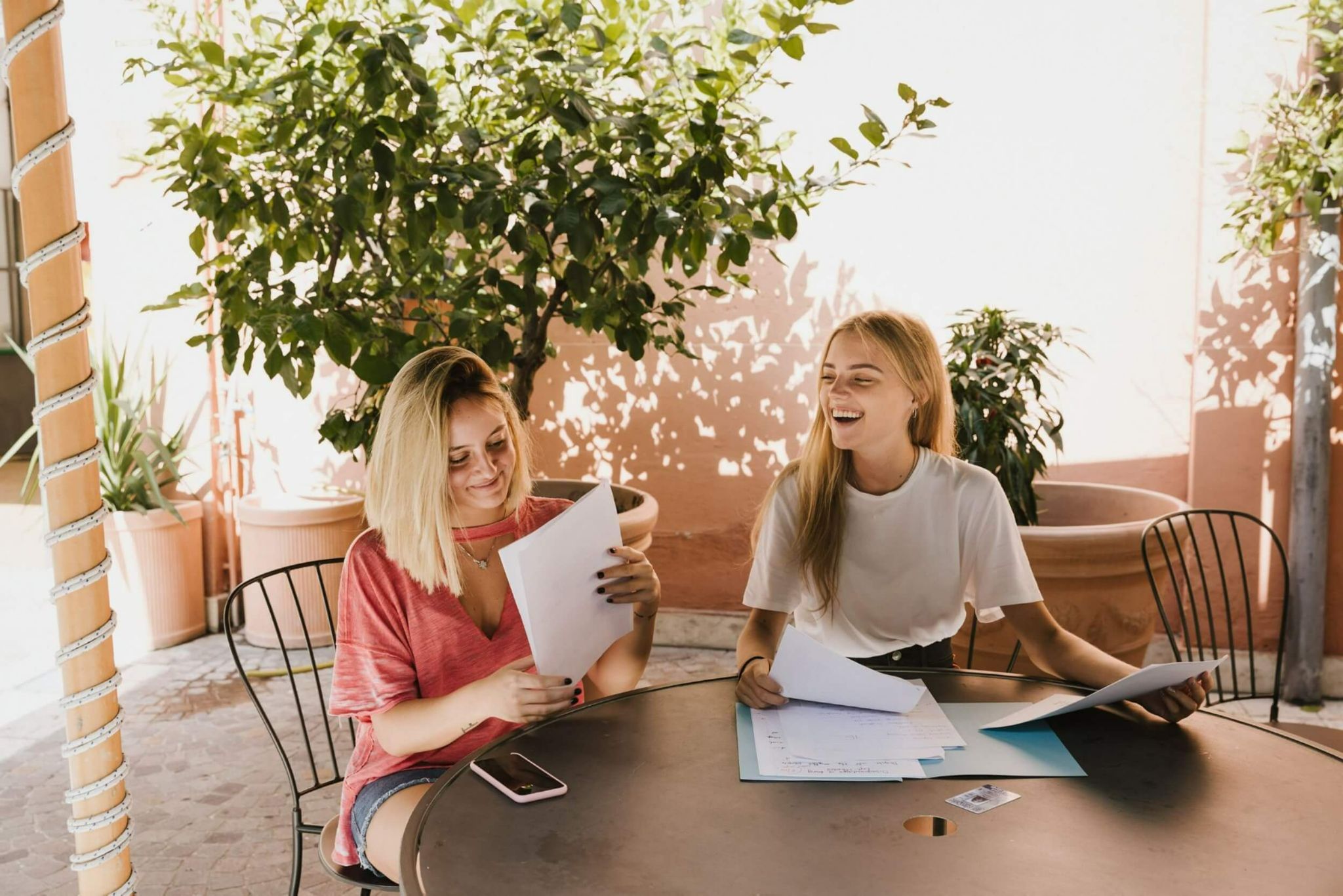 students earning an MA in international affairs studying together outside