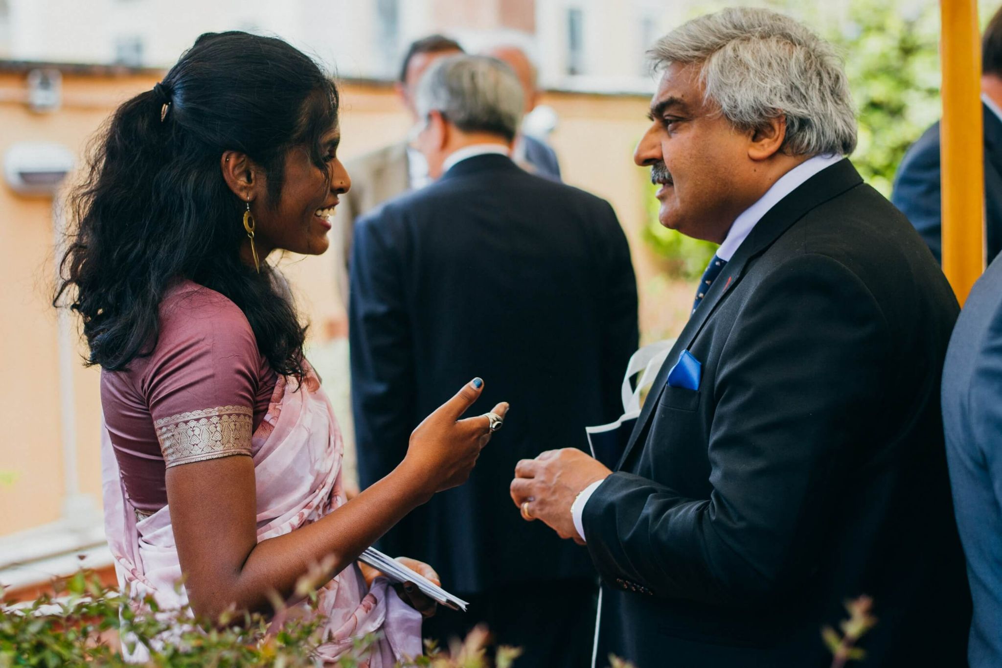 student discussing religious life with a lecturer as they study abroad in Rome