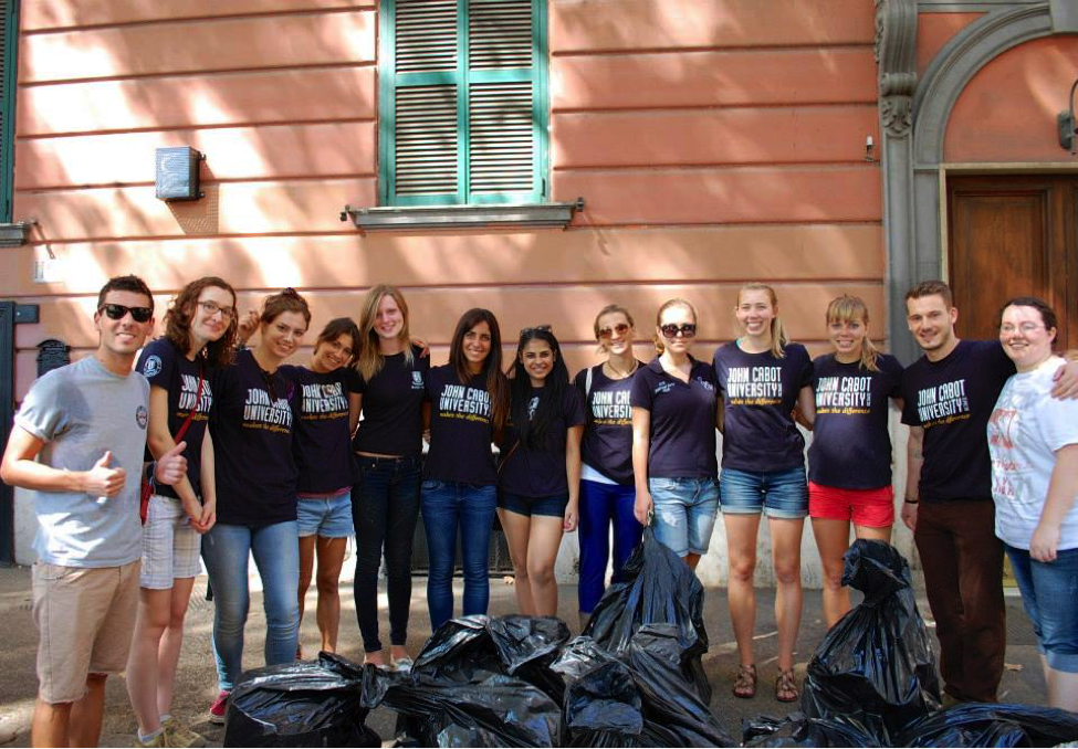 JCU students get involved with the community and clean local parks, Two John Cabot University students at the Guarini Campus, Ways to Meet New People while you Study Abroad in Rome, making friends in college, international schools in Rome, JCU cooking class