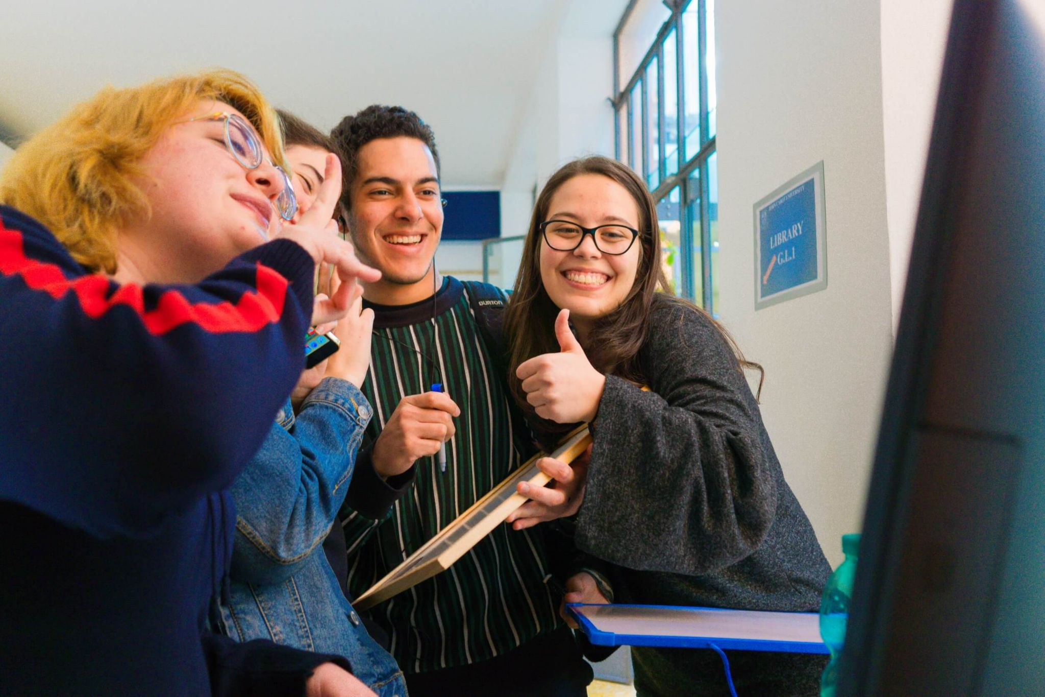 smiling friends socializing as they study abroad in Italy