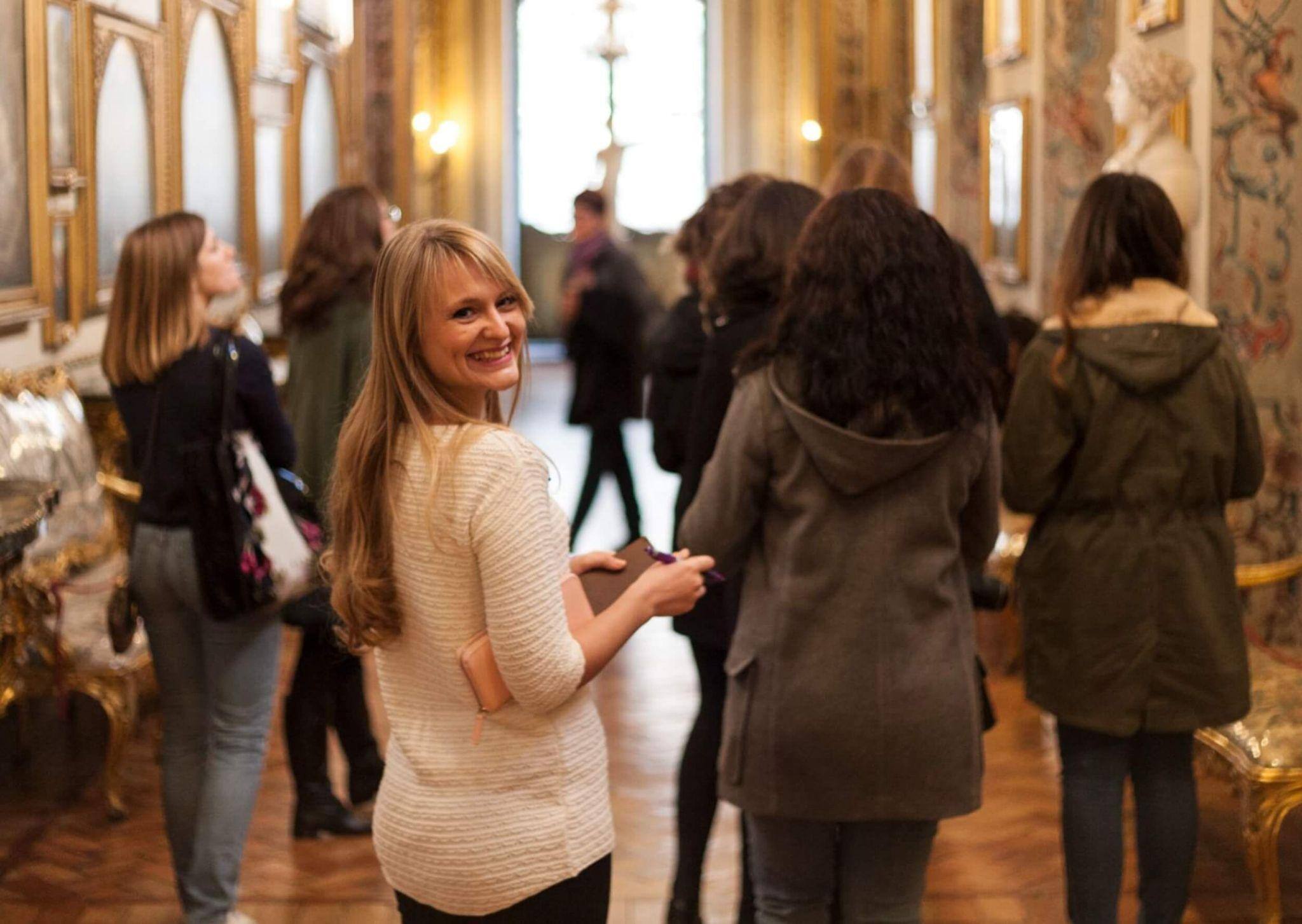 A class of students touring a gallery as they study art history in Rome