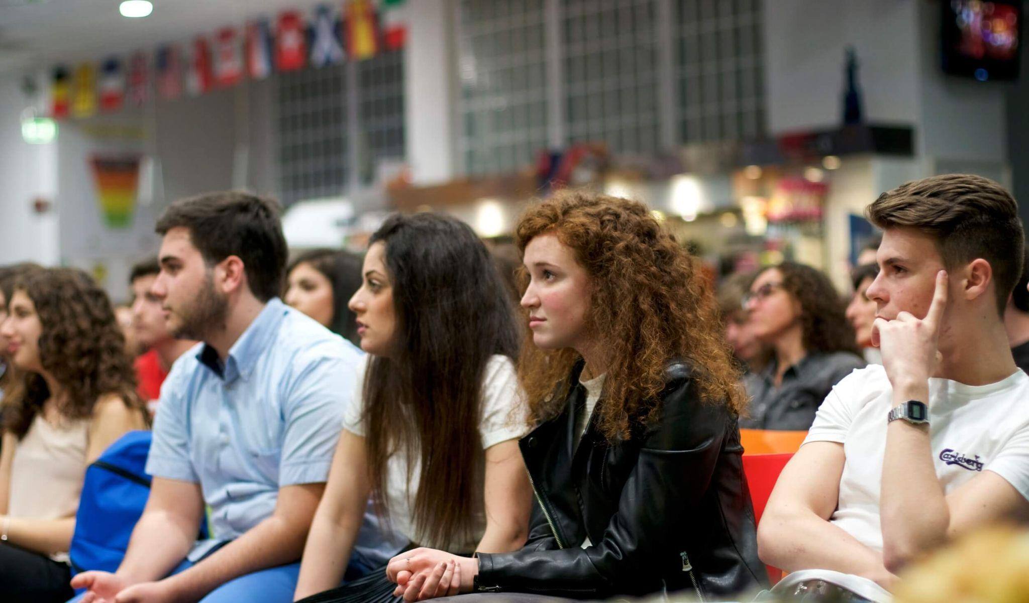 A group of students receiving lectures in a classroom at JCU
