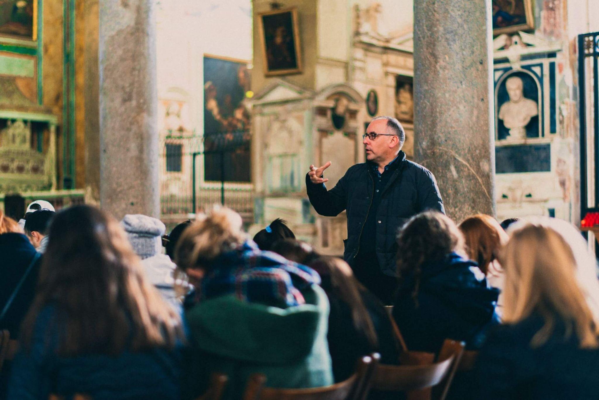 A John Cabot professor teaching an on-site class.