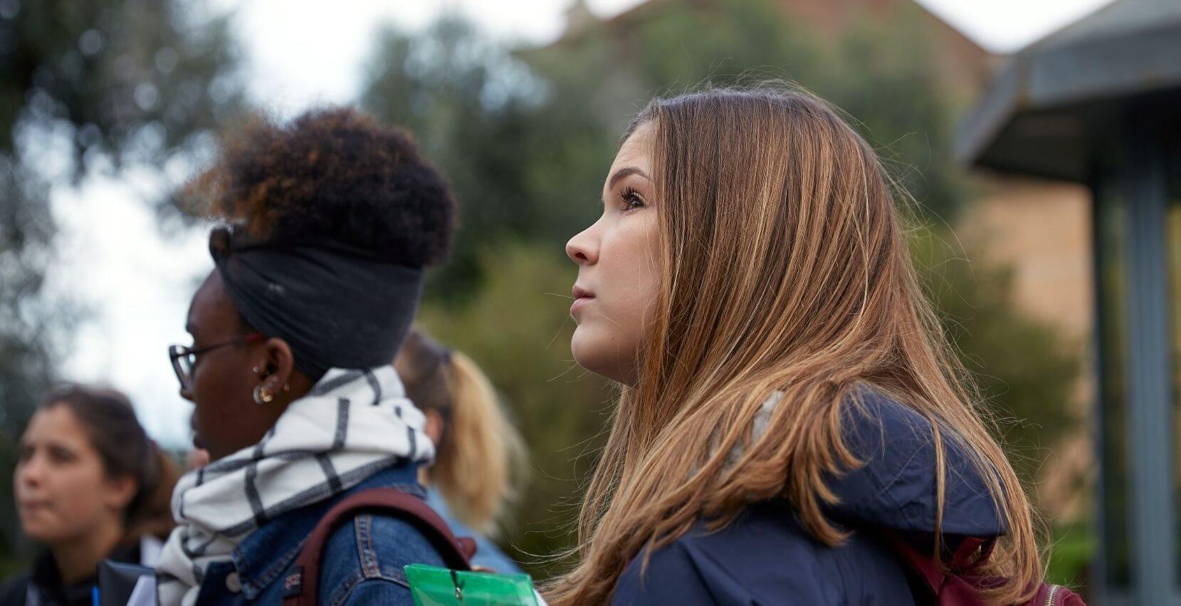 A student attending university in Rome walking outside