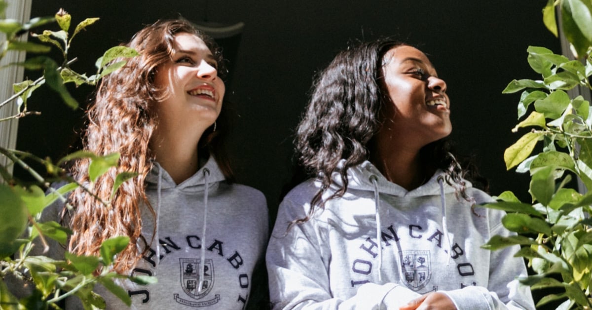 Two female JCU students smiling 