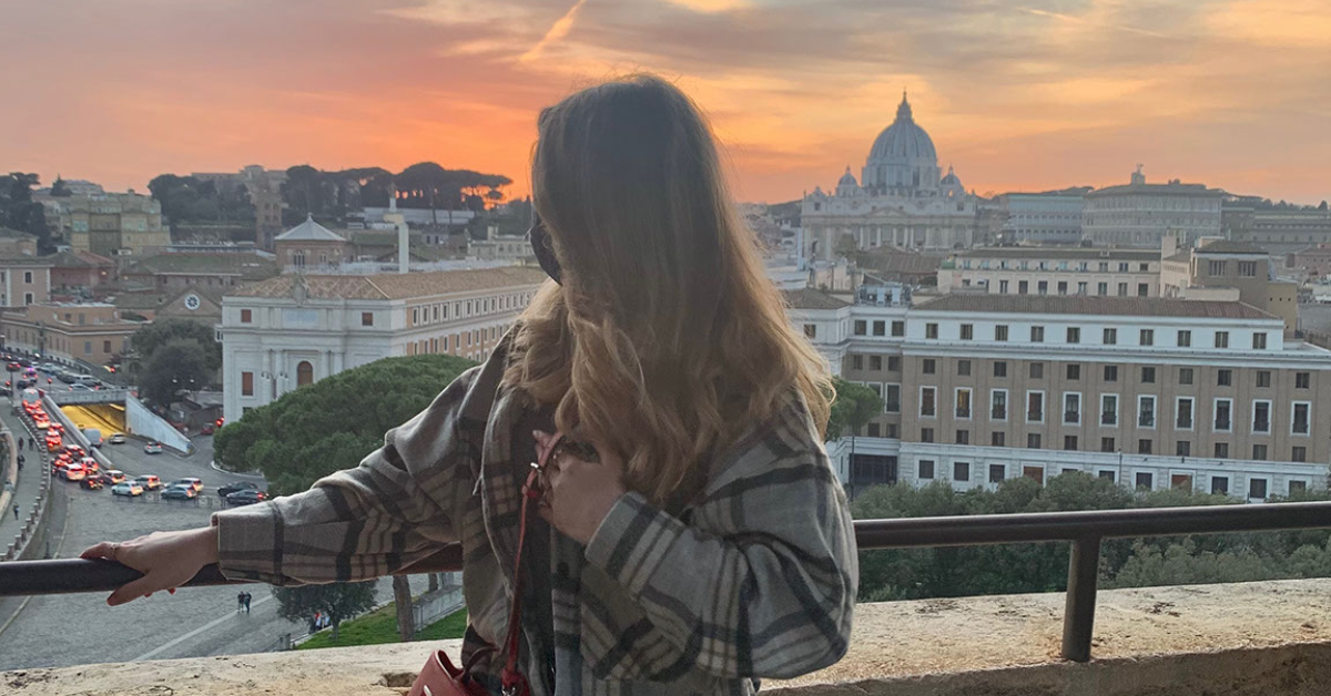 Girl holding onto the railing