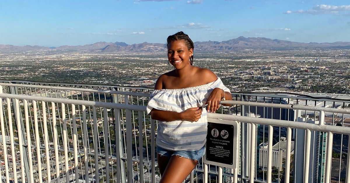 Girl standing at a viewpoint