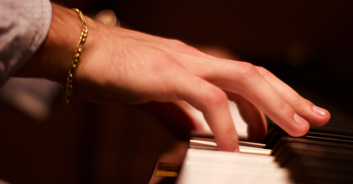 Student playing the piano