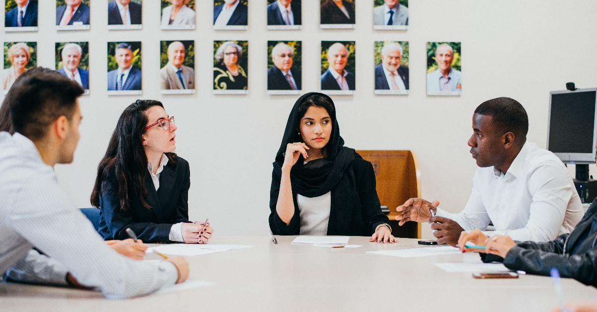 Students discussing plans for a startup business