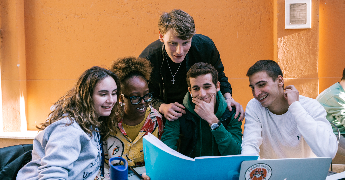 Students looking at notes from class