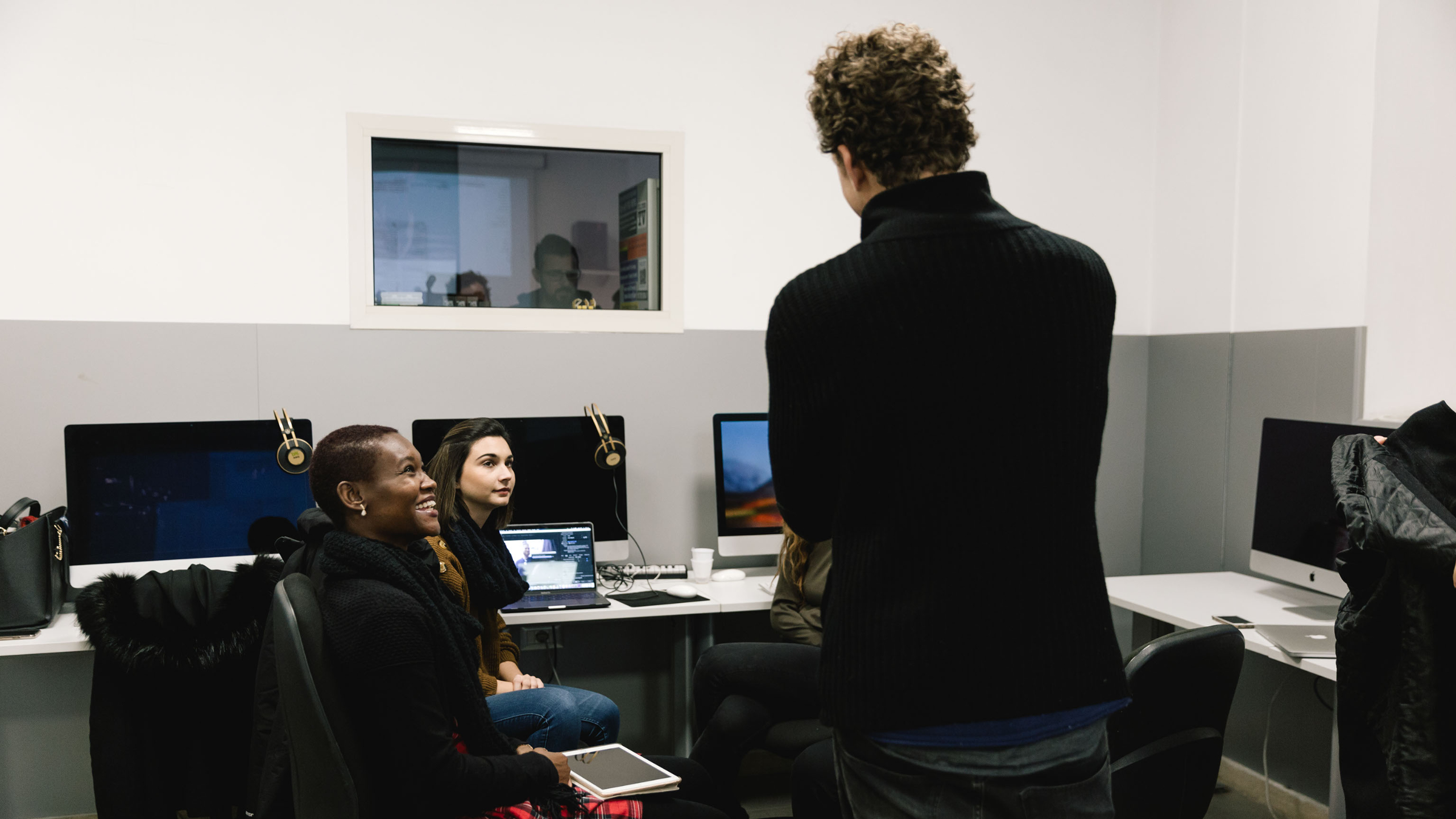 Professor talking to his students