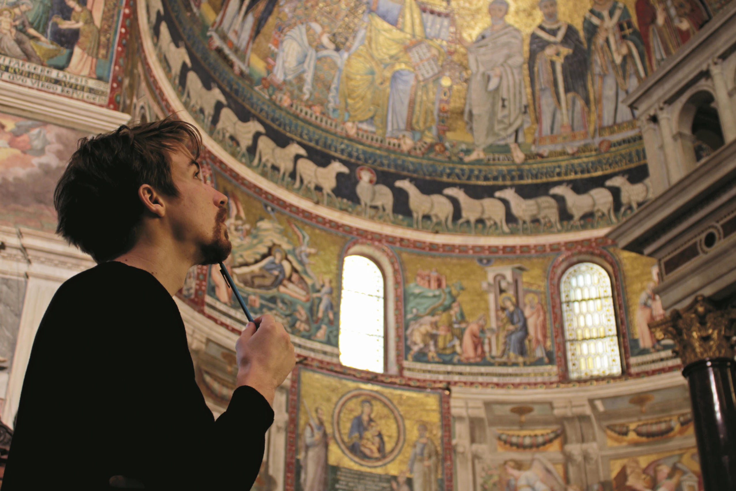 Man staring up at the ceiling of the Pantheon