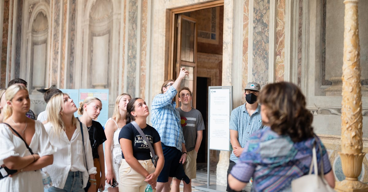 Class taking place in a museum in Rome