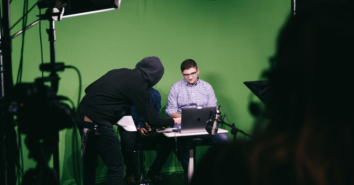 Students setting up for filming in the TV Studio lab