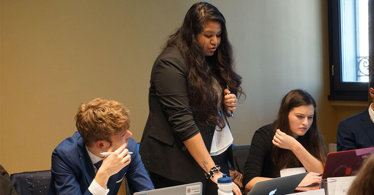 3 students having a discussion