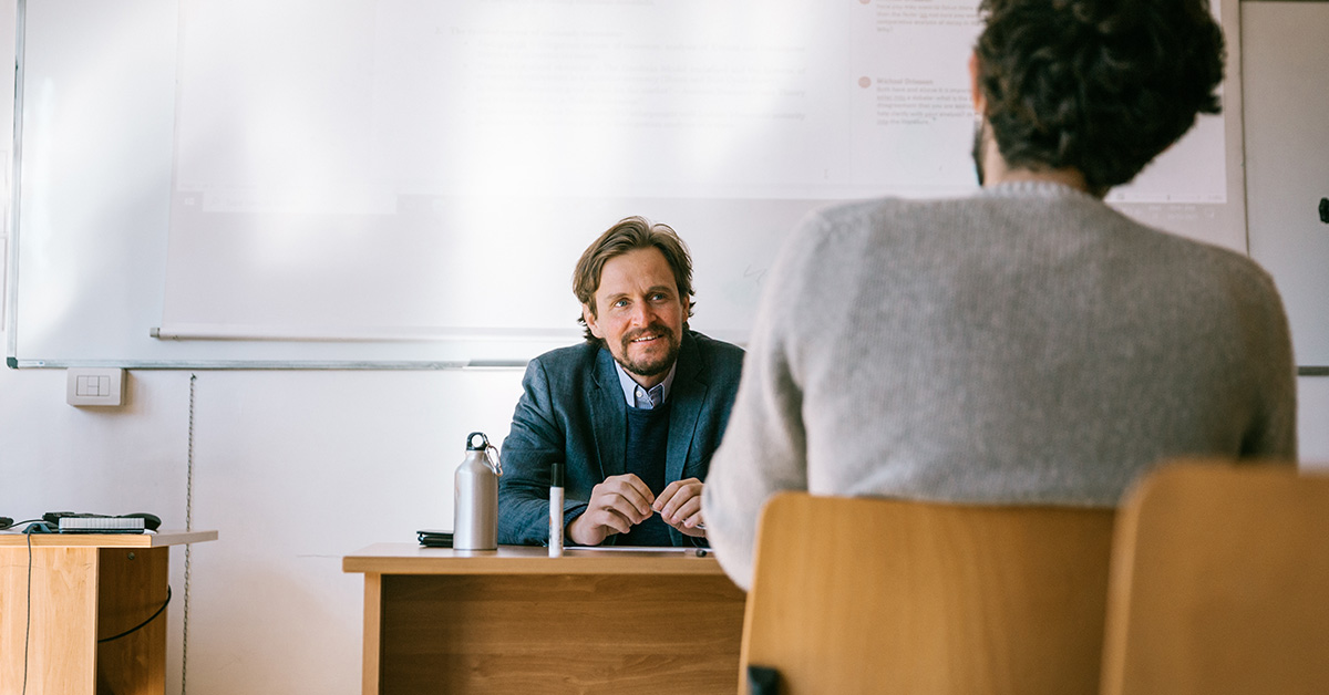 A John Cabot professor teaching a class.