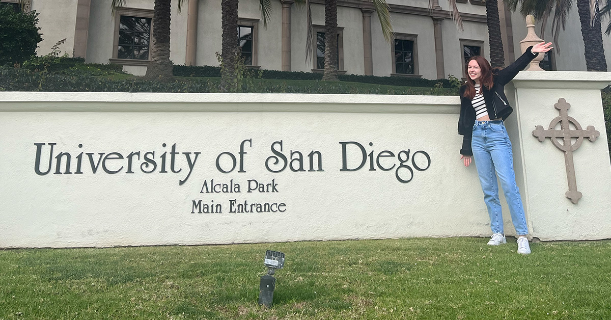 Student in front of University of San Diego
