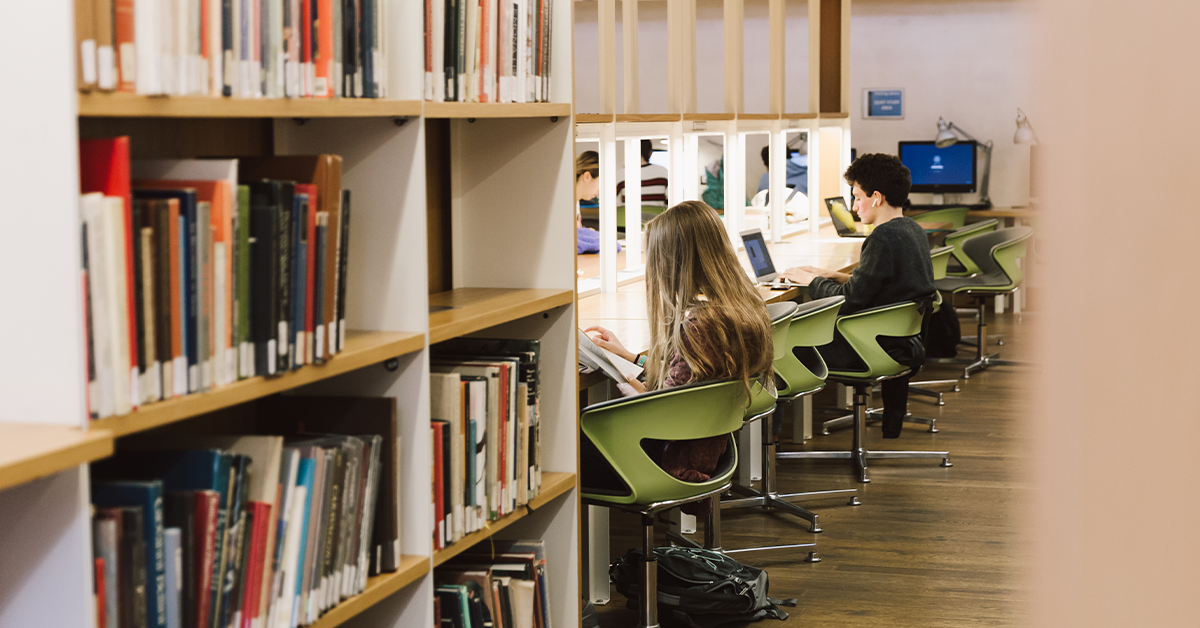 Study abroad students studying in the library